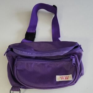 Ultra Gear Purple Crossbody Bag. Has 3 Compartments